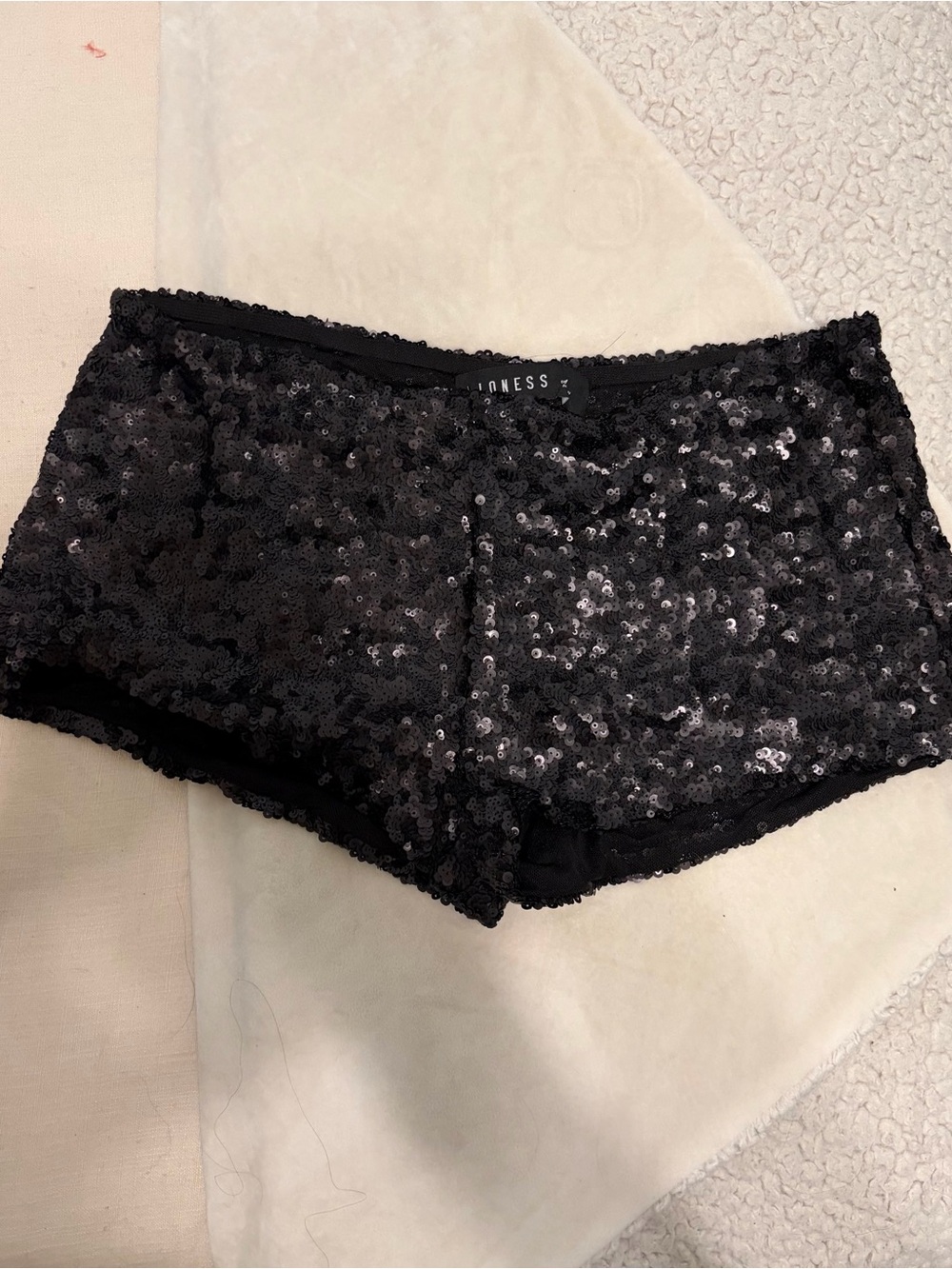 Lioness Sequin Mini Shorts in Black